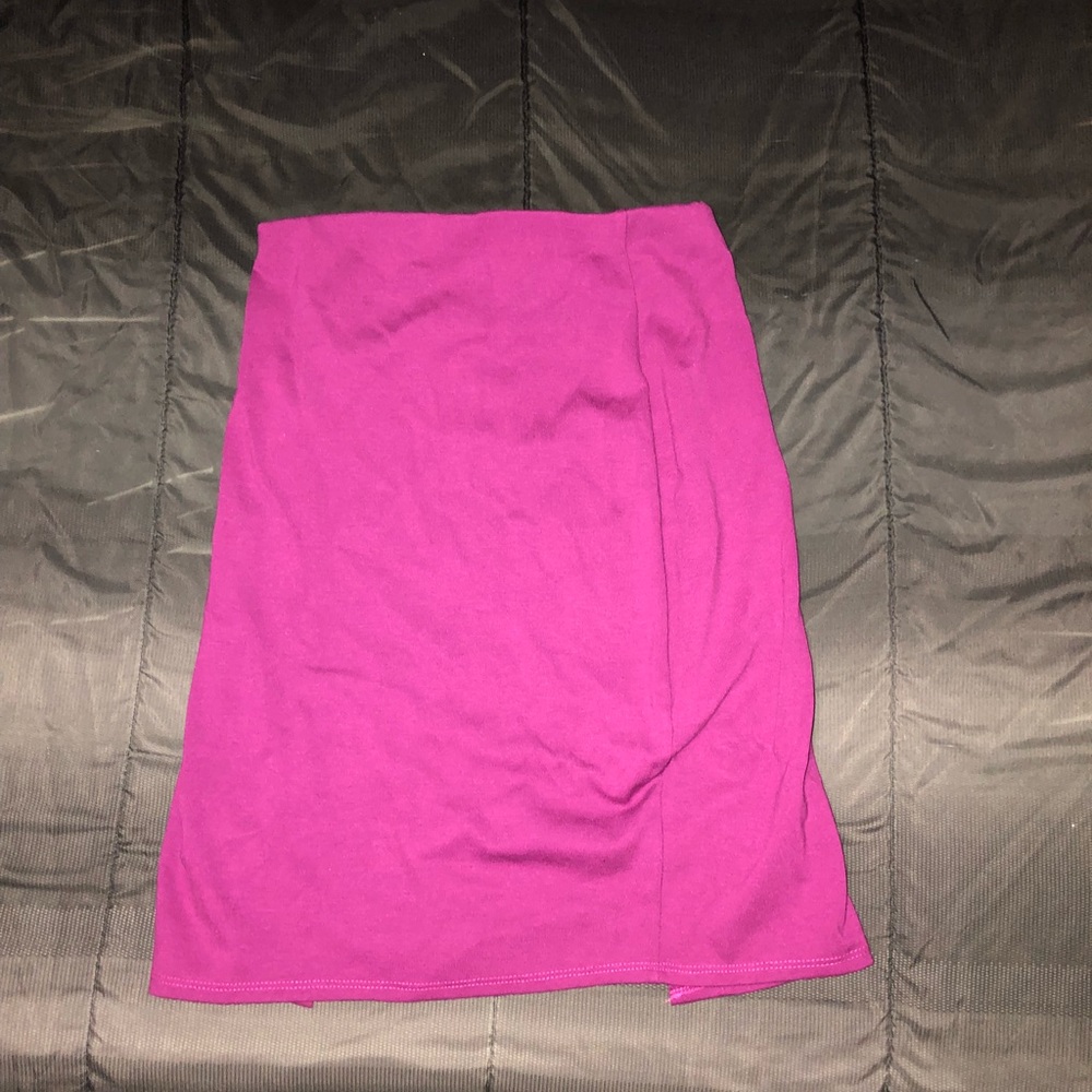 Purple mid length skirt.